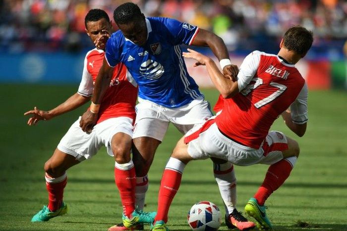 Montreal Impact's Didier Drogba (C) fights for the ball with Arsenal's Krystian Bielik during an MLS All-Star match at Avaya Stadium in San Jose, California, in July 2016