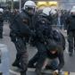 A video grab shows a fan being taken into custody ahead the German First division Bundesliga football match between Borussia Dortmund and RB Leipzig in Dortmund, western Germany, on February 4, 2017