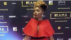 Yemi Alade performed in a red cape top paired with sequin bum shorts