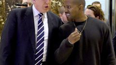 Singer Kanye West and President-elect Donald Trump arrive to speak with the press after their meetings at Trump Tower December 13, 2016 in New York
