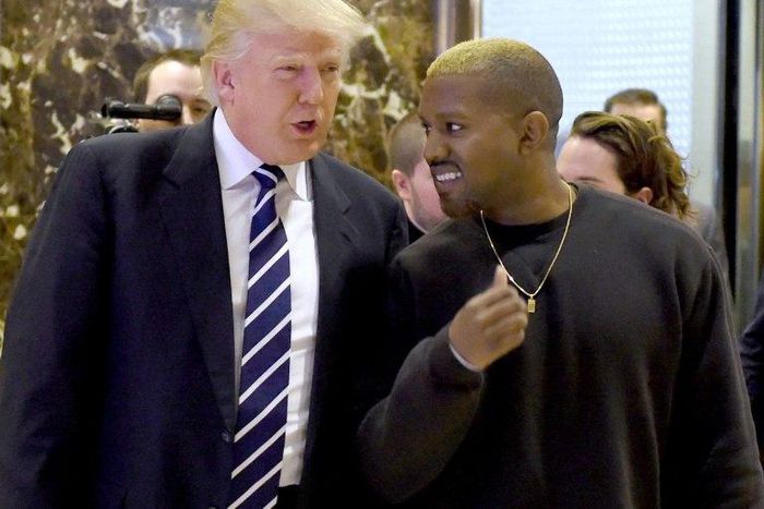 Singer Kanye West and President-elect Donald Trump arrive to speak with the press after their meetings at Trump Tower December 13, 2016 in New York
