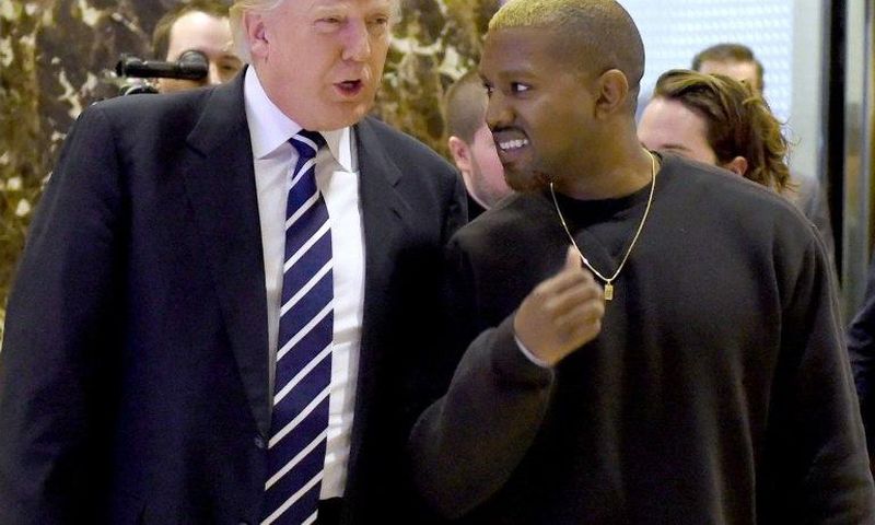 Singer Kanye West and President-elect Donald Trump arrive to speak with the press after their meetings at Trump Tower December 13, 2016 in New York