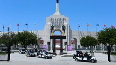 International Olympic Committee officials, and LA 2024 officials, including LA Mayor Eric Garcetti, leave on golf carts following a tour at the Los Angeles Memorial Coliseum as the IOC Evaluation Commission continues with its visit to Los Angeles