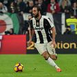 Juventus' forward from Argentina Gonzalo Higuain controls the ball during the Italian Serie A football match Juventus vs Napoli at Juventus Stadium in Turin on October 29, 2016