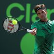 Roger Federer of Switzerland returns a shot against Juan Martin Del Potro of Argentina during Day 8 of the Miami Open at Crandon Park Tennis Center on March 27, 2017 in Key Biscayne, Florida