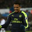 Alexis Sanchez scored the last of Arsenal's four goals against Swansea but appeared far from happy when he was taken off in the final quarter