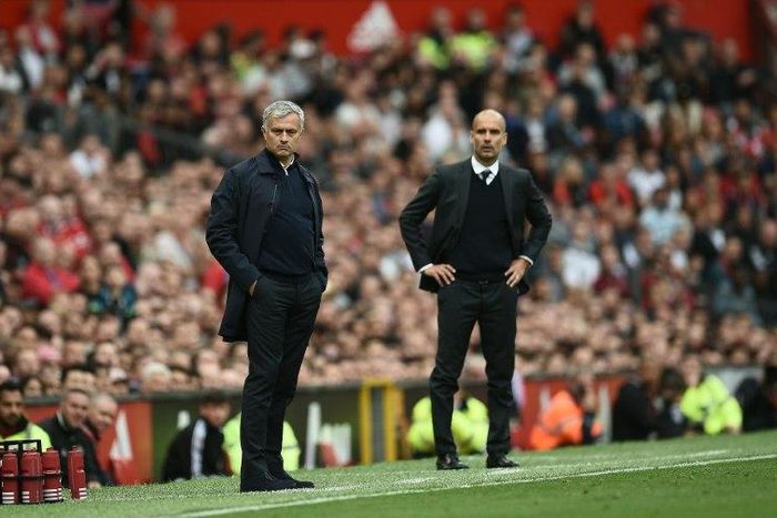 Manchester City's Pep Guardiola (R) will be looking to score a season's second win over Manchester United's Jose Mourinho on Wednesday in the English League Cup fourth round