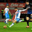 Napoli's forward Dries Mertens (L) kicks the ball during the Italian Serie A football match against Atalanta on February 25, 2017