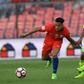 Chile's Alexis Sanchez (L) fights for the ball with Venezuela's Renzo Zambrano during their Russia 2018 World Cup qualifier match, in Santiago, on March 28, 2017