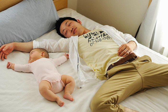Father and child sleeping