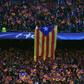 A giant Estelada, the flag for Catalan independence, is displayed by Barcelona supporters before a Champions League match at the Camp Nou stadium in Barcelona on April 19, 2017