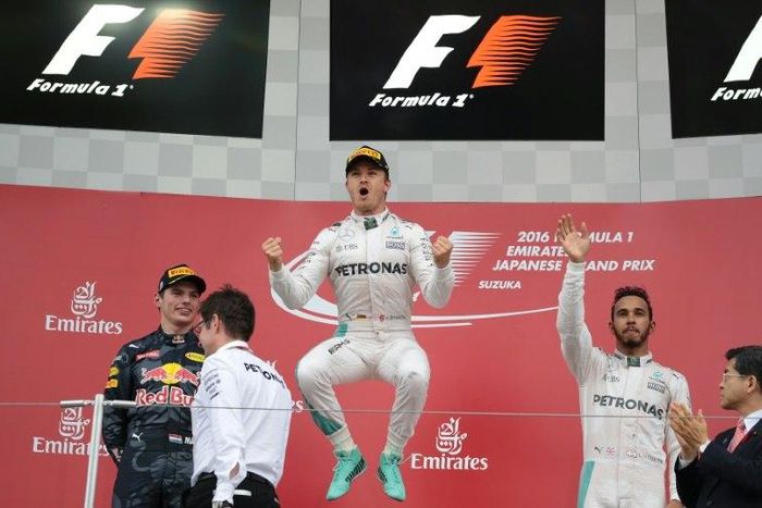 Nico Rosberg (C) claimed his first Suzuka win from pole as Lewis Hamilton took third after a dreadful start
