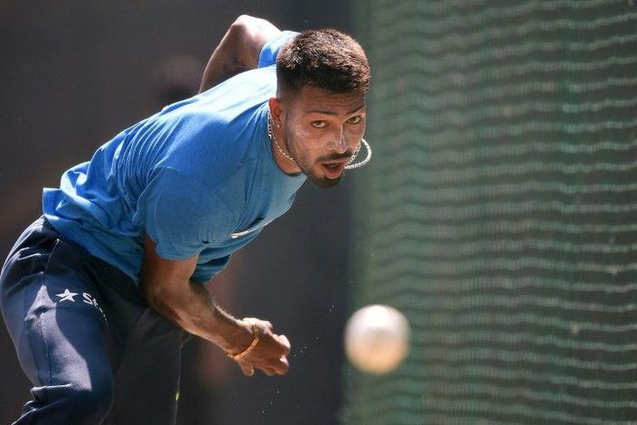 India's Hardik Pandya bowls in the nets during a training session in New Delhi, on October 19, 2016