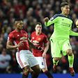 Manchester United's midfielder Antonio Valencia (L) vies with Liverpool's midfielder Roberto Firmino during the English Premier League football match between Manchester United and Liverpool on January 15, 2017