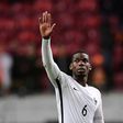 France's midfielder Paul Pogba celebrates his team's victory on October 10, 2016