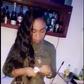 Shatta Michy cleaning the glass cups with the same tissue paper she used for to wipe her lips