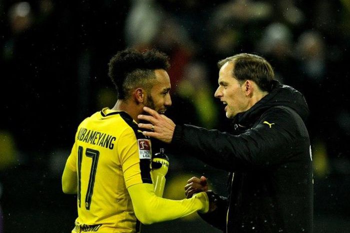 Dortmund's head coach Thomas Tuchel celebrates with forward Pierre-Emerick Aubameyang after their win against Leipzig, in Dortmund, western Germany, on February 4, 2017