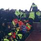 Police and stewards try to separate supporters of West Ham United and Chelsea as they confront each other during the English League Cup match at London Stadium on October 26, 2016