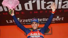 Italy's rider of team Bahrain - Merida Vincenzo Nibali celebrates on the podium after winning the 16th stage of the 100th Giro d'Italia, Tour of Italy, cycling race from Rovetta to Bormio on May 23, 2017