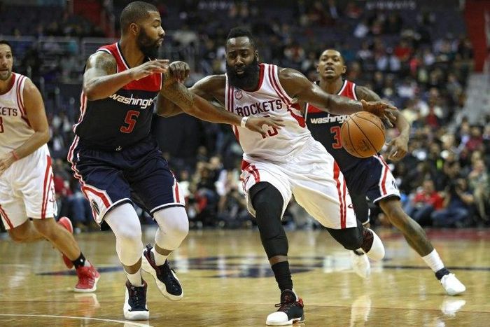 James Harden of the Houston Rockets dribbles the ball past Markieff Morris of the Washington Wizards on November 7, 2016 in Washington, DC