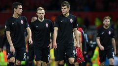Zorya Luhansk players leave the pitch following their UEFA Europa League Group A match against Manchester United, at Old Trafford in Manchester, on September 29, 2016