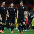 Zorya Luhansk players leave the pitch following their UEFA Europa League Group A match against Manchester United, at Old Trafford in Manchester, on September 29, 2016
