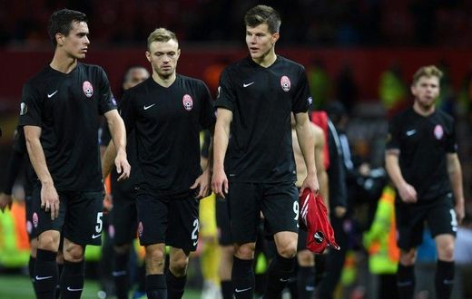 Zorya Luhansk players leave the pitch following their UEFA Europa League Group A match against Manchester United, at Old Trafford in Manchester, on September 29, 2016