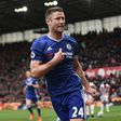 Chelsea's defender Gary Cahill (C) celebrates after scoring on March 18, 2017