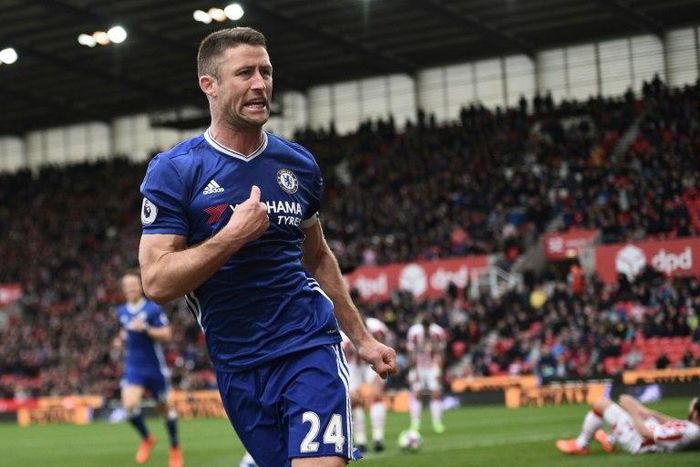Chelsea's defender Gary Cahill (C) celebrates after scoring on March 18, 2017