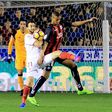 Sevilla's defender Nicolas Pareja (C) fights for the ball with Alaves' forward Deyverson Silva during a Spanish league football match on March 6, 2017