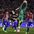 Atletico Madrid's goalkeeper Jan Oblak stops a ball during the UEFA Champions League round of 16 second leg football match against Bayer Leverkusen March 15, 2017