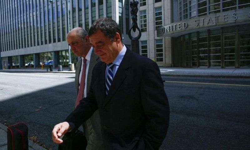 Costas Takkas (R), former secretary-general of the Cayman Islands Football Association seen leaving the Eastern District Court in Brooklyn, New York last year, pleaded guilty to Money laundering conspiracy in the sweeping FIFA corruption scandal