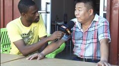One of the Chinese national speaking to Accra-based Adom FM