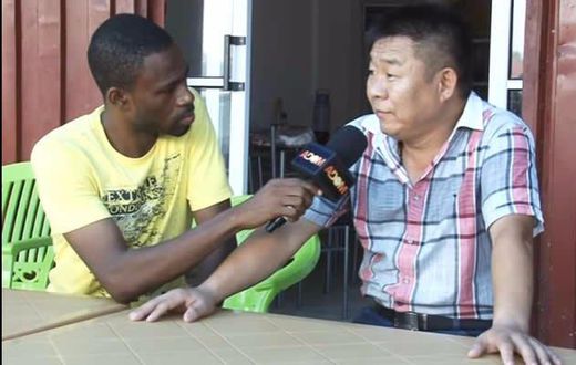 One of the Chinese national speaking to Accra-based Adom FM