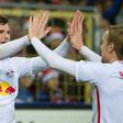 Leipzig's forward Timo Werner (L) celebrates with teammate forward Emil Forsberg after he scored during the German first division Bundesliga football match against SC Freiburg November 25, 2016