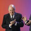 FIFA President Sepp Blatter (left) and FIFA General Secretary Urs Linsi applaud during the opening ceremony of the 57th congress of the world football governing body in Zurich on May 30, 2007