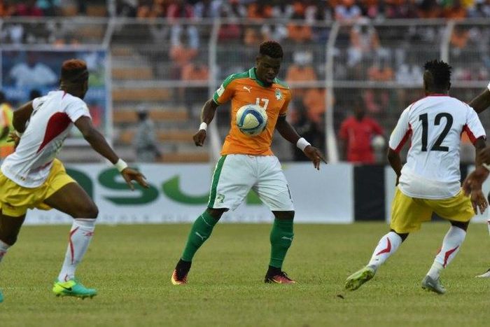 Ivory Coast's Serge Aurier (C) celebrated a goal against Mali by turning to the crowd and dragging his finger across his throat