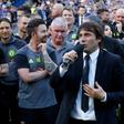Chelsea's head coach Antonio Conte (C) talks during the presentation ceremony for the English Premier League trophy at the end of the Premier League football match between Chelsea and Sunderland at Stamford Bridge in London on May 21, 2017