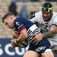 Bordeaux-Begles flyhalf Ian Madigan (left) is tackled by Clermont lock Sebastien Vahaamahina during their European Champions Cup clash in Bordeaux on January 15, 2017