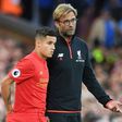 Brazil international Philippe Coutinho (L) has been one of Liverpool's key performers this season and he hailed the resilience that coach Jurgen Klopp (R) has instilled in the squad