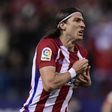 Atletico Madrid's defender Filipe Luis celebrates after scoring during the Spanish league football match Club Atletico de Madrid vs Real Sociedad at the Vicente Calderon stadium in Madrid on April 4, 2017