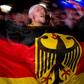 German fans react after their side beat Argentina in the 2014 World Cup final