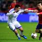 Spain midfielder David Silva (R) is challenged by Israel midfielder Almog Cohen during the World Cup 2018 group G qualifier at El Molinon stadium in Gijon on March 24, 2017