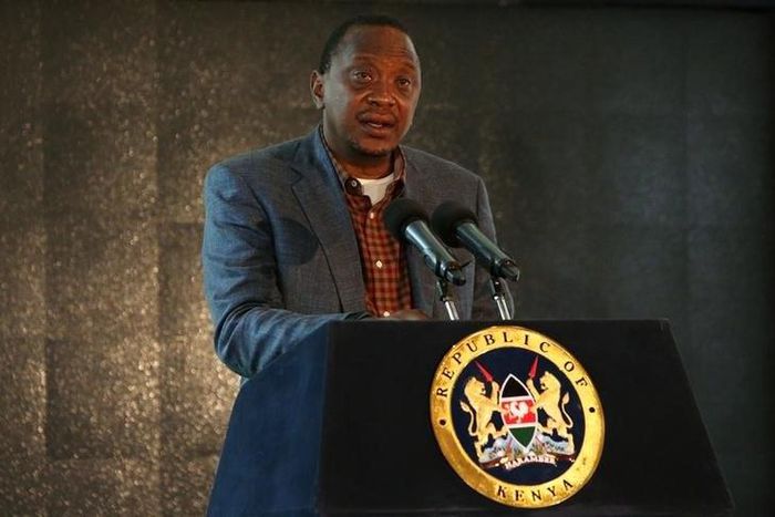 Kenyan President Uhuru Kenyatta addresses an audience during the second day of the Giant Club Summit of African leaders and others on tackling poaching of elephants and rhinos at the Fairmont Mount Kenya Safari Club in Nanyuki, Laikipia county, Kenya, ...