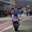 Movistar Yamaha MotoGP's Spanish rider Maverick Vinales celebrates after winning the 2017 Qatar MotoGP