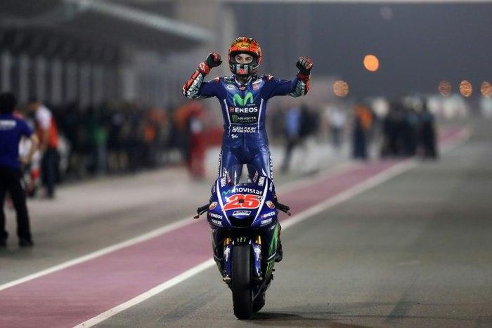 Movistar Yamaha MotoGP's Spanish rider Maverick Vinales celebrates after winning the 2017 Qatar MotoGP
