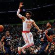 The New Orleans Pelicans had to play much of the game against the Atlanta Hawks without Anthony Davis (C) after he was hurt in the first quarter of the game