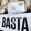Supporters of Italian football team AS Roma hold a map of the new proposed stadium in front of City Hall on Capitoline Hill at Piazza del Campidoglio in Rome on February 24, 2017
