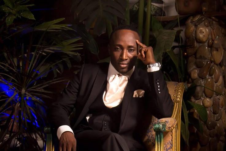 George Quaye in suit