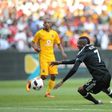 Tendai Ndoro of Orlando Pirates (L) vies with Erick Mathoho of Kaiser Chiefs during their derby football match on October 29, 2016 at the FNB Stadium in Johannesburg